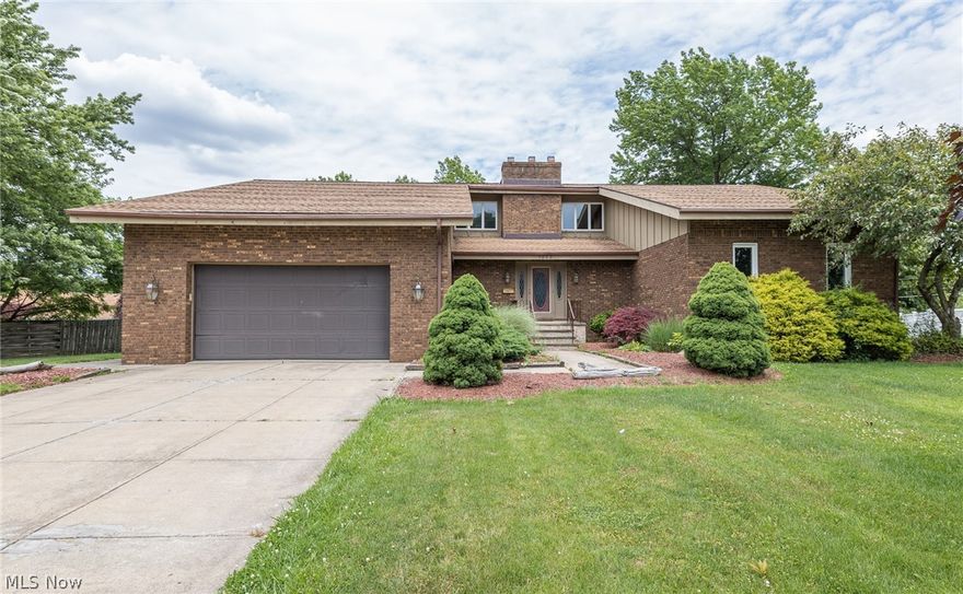 Very unique contemporary 5 bedroom, 3 full bath, 1 half bath home on a cul-de-sac.  Space galore, approximately 3300 square feet on the first and second floors and another 2500 square feet in the lower level.  The lower level is finished with a wood burning fireplace, full bath, wet bar, sauna and game room.  The first floor has a laundry room, formal dining room and a gas fireplace.  The owner's suite has a private bath and electric fireplace. To top it off this home has an in ground pool , 2 hot tubs, attached covered rear entertaining area, and huge yard for gatherings.