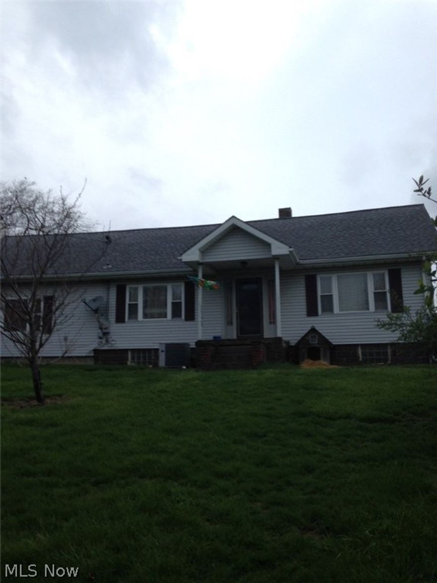 10.61 acres,  improved with a 1 1/2 story 3 bedroom home. A 40x80 shop building, 36' x 36' garage, 20x17 outbuilding, pavillon. No other properties for sale on  the market place like this.