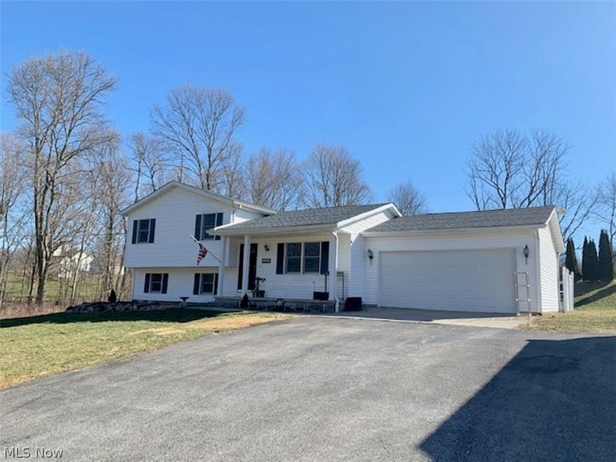 Close your eyes and repeat: "There's no place like home!" This beautiful split level home in Leetonia Local Schools is now available. Three bedrooms, and 2 full baths. Plenty of space for fun and food. Dining room with electric fireplace and a family room in the lower level! You could have a 4th bedroom or office in the lower level. Located on 1.69 acres of land with your own fenced in above ground pool and patio. Grab Toto and make the move now, before mean old Miss Gulch gets it for herself!