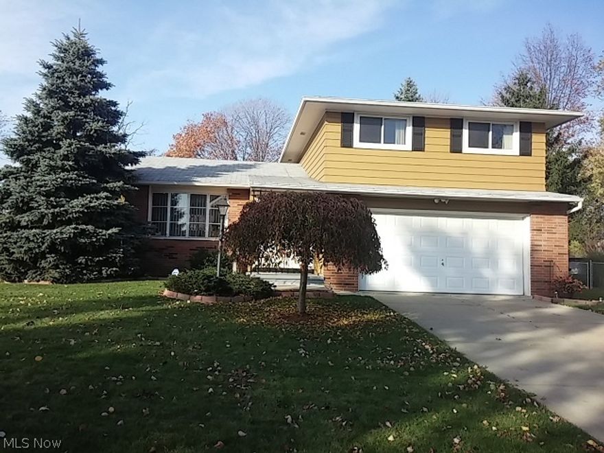 A rare find on picturesque street of well cared for homes. Super 4 level split with true finished basement! Upgrades galore - Beautiful hardwood floors in living room and dining room.  Walk-out family room.  Kitchen has many updates including upgraded stainless steel appliances and tile flooring.  Updated baths. Private fenced back yard with large patio for entertaining and spacious shed for extra storage.