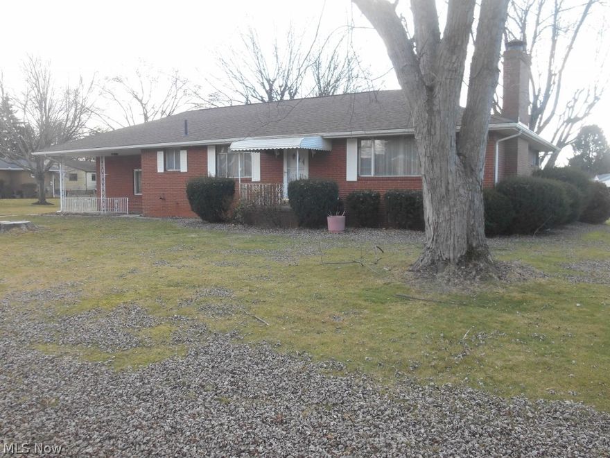 Check out this fantastic all Brick Ranch located in Plain Township! Wonderful three bedroom home makes first floor living a breeze.  The kitchen has vinyl flooring with a good amount of cabinet space provided.  Entertain in the formal dining room with carpet flooring! Three nice sized bedrooms with all natural wood flooring in each with one bedroom offering a half bath added on! The living room is spacious at 13x23 square feet and has a large picture window filling the room along with a fireplace as well! Home offers a two car attached garage and a lovely covered front porch.  FHA Ready, Radon Mitigation Complete and Electric Service updated inside and out.  A great home to call your own!