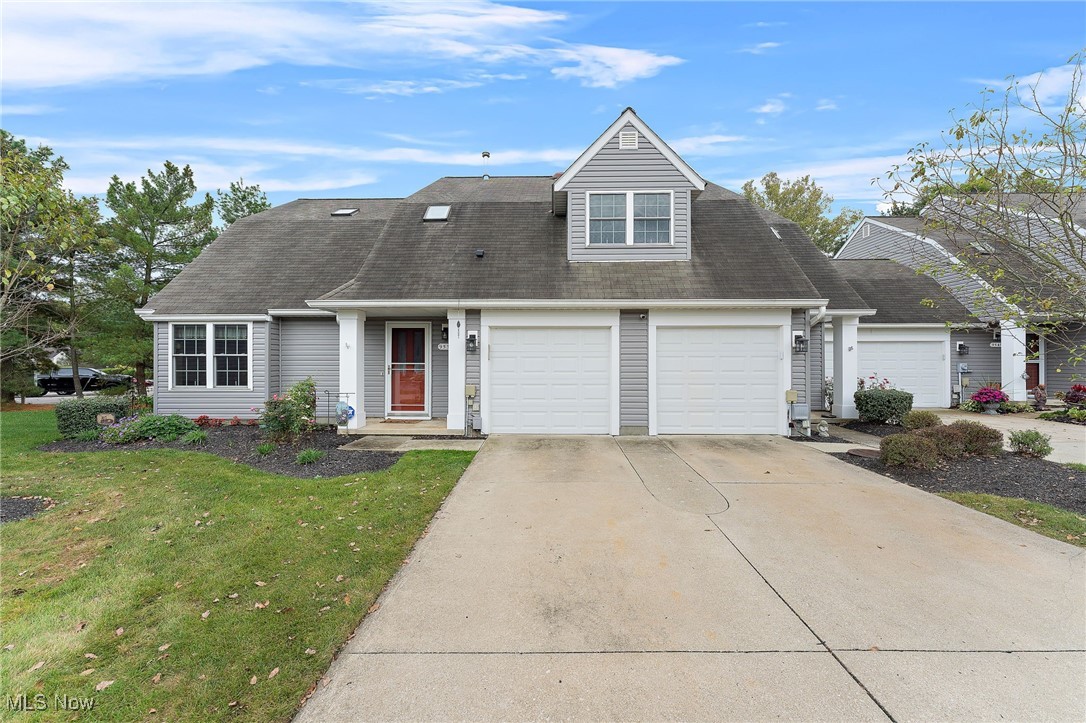 Welcome to 9537 Ridge Ct #7 – A Charming Twinsburg Townhome! This inviting 2-bedroom, 1.5-bathroom home offers the perfect blend of comfort, convenience, and style—all with an attached garage for everyday ease. Step inside to a warm and welcoming living room featuring plush carpeting, abundant natural light, and sliding door access to your private back patio—ideal for morning coffee or evening relaxation. The kitchen is thoughtfully designed with ample cabinet space, stainless steel appliances, and easy-care tile flooring, along with a pass-through window that keeps the space connected to the living area. A cozy dining room with a large picture window overlooking the front yard creates the perfect setting for family meals or casual gatherings. Completing the main level are a convenient half bathroom and an in-unit laundry area. Upstairs, you’ll find two spacious bedrooms, each with its own walk-in closet, along with a full bathroom that serves the upper level. Enjoy the outdoor patio for grilling, relaxing, or entertaining friends. The community’s prime location offers close proximity to shopping, dining, hospitals, freeways, and beautiful parks—everything you need just minutes from your door. This move-in ready home has it all—don’t miss your chance to make it yours!
