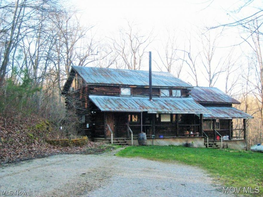 Approx. 10 miles from Parkersburg. Rustic log cabin home with 23.35+- Wooded Acres! Very secluded. Remodeled kitchen with 40+ newer cabinets/stainless steel appliacnes and counter tops. Half bath on first floor has been updated. Living room with pellet stove for heating with additional propane wall unit.   Bedrooms are on second level along with a full bath.  Private gravel driveway to property. Priced per recent appraisal. PLEASE NO DRIVE BY SHOWINGs MAKE APPOINTMENT - THIS IS PRIVATE PROPERTY!!!!!!!!!!!!!!!!!  Elem: Kanawha Elementary School  Elem/Bus: Y  JrHigh: Van Devender Jr. High School  JrHigh/Bus: Y  High: Parkersburg High  High/Bus: Y  Fire: VOL  Police: SHF  PossFreeGas: N  ;SQFT=Fin L1:1134, Fin L2:995, Fin Bsmt:0, Fin Above:2129, Fin Total:2129, Unfin Above:0;PRKG= Off Street