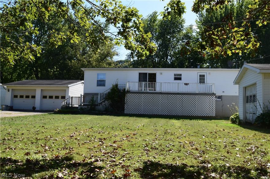 Riverfront property! This property has river frontage on the Muskingum River which is great for year-round living or a weekend getaway. The main level of the home has a large living room, a kitchen that is open to the dining room, 3 bedrooms, 2 full baths, a laundry room, and a large sun porch. There are two garages, a two-car garage, and a one-car garage. This home sits on a large lot with a partially fenced in yard. There is a spacious deck on the front of the home and the large sunroom and deck on the rear of the home. This home is on a large crawl space that has poured walls, a concrete floor and is 5 feet tall.  Direct river frontage where you can add a dock for your boat, enjoy fishing from the shore or just sit back and enjoy the view. Move-in ready.