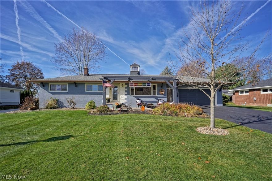 This amazing Schumacher built home has been updated and is a blend of farmhouse, industrial & contemporary style!  You really must see it to believe the details, quality and special features that it has to offer.  The spacious living room has hardwood floors, wood beams and a gorgeous barn door, which leads you into the eat in kitchen/dining area.  The kitchen features Kraftmaid cabinets with custom California cedar doors with metal accents, pull outs, under cabinet lighting, tin ceiling and high end appliances (new microwave is on order).  The finished lower level offers 3 finished spaces perfect for a recreation room (with bar) and the options are endless - exercise room, craft room, office - whatever fits your needs.  The outside is a dream with it's concrete patio, swing, and tremendous cedar outbuilding, which offers black metal roof, vaulted cedar beams, many windows allowing for an abundance of natural light, wood burning fireplace, stamped concrete floor,  and electricity.  You