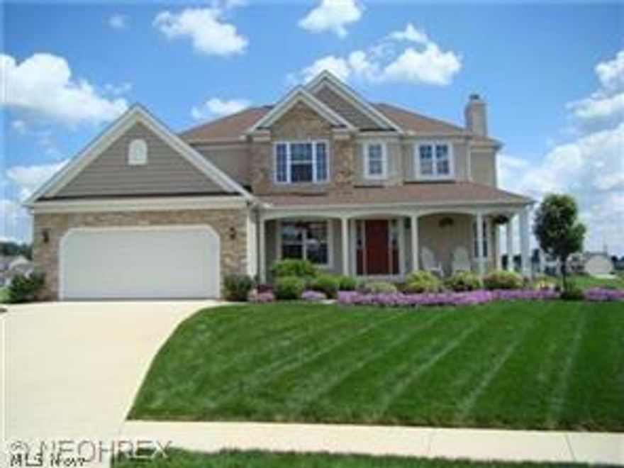 Former model home with many extras! Much curb appeal on this beautiful stone/vinyl sided two story with amazing views of  a large pond from your own multi-level deck! Extras include hardwood floors in kitchen, 2 story foyer. Dining rm. has wainscoting, tray ceiling. You will love the easy flowing concept  on 1st floor. Great room, dining, foyer, dinette/kitchen are all open with arches and pillars. Updated kitchen with glass tile backsplash, butcher block counter on island, attractive  hardware and boasts a large pantry. 1st floor laundry rm. Huge windows in great room, dinette bring in plenty of light and peaceful water views.  Large master bedroom / huge walk-in closet and plush private bath with garden tub, double vanities,  walk in shower.  2nd bedroom has walk-in closet as well. Newly finished family room in lower lvl. with bedroom and media area.  Nice cul-de-sac lot. A house with this many amenities on a premium waterfront lot is hard to find! Heritage Glen in Lake Schools.