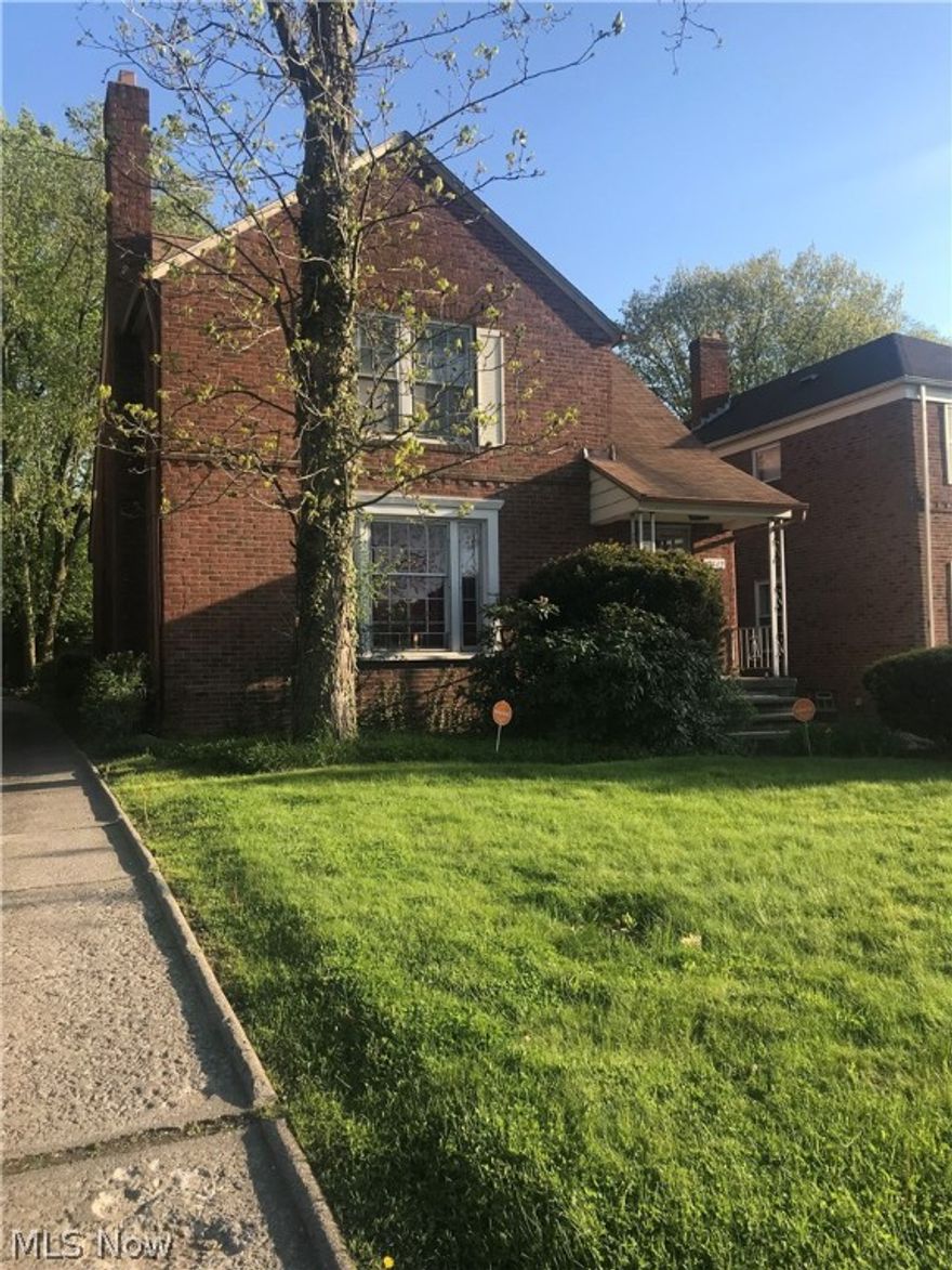 Wonderful income producing 2 family in the heart of University Heights. Lovely brick colonial. Each unit has 2 bedrooms, formal living room with fireplace, formal dining rooms and spacious kitchens.  A must see, close to universities, hospitals, shopping, and restaurants.