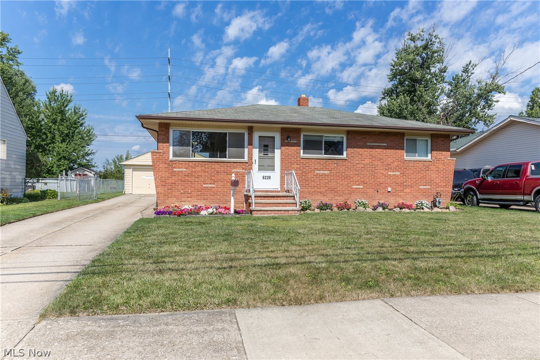 This 3 bedroom brick ranch home with 1,000+ sq. ft. features hardwood floors in the bedrooms, a beautiful updated kitchen with newer appliances, a full basement, and a 2+ car garage. The home is very clean with neutral paint and beautiful light shinning in the many windows. The fenced backyard is extra large and the sale of this home includes the shed. Brand new carpet was installed in the living room and hallway. Rest easily because the sellers are providing a 1 year home warranty. Call today to schedule and appointment and learn how you my be able to purchase this home for only $3700 downpayment.