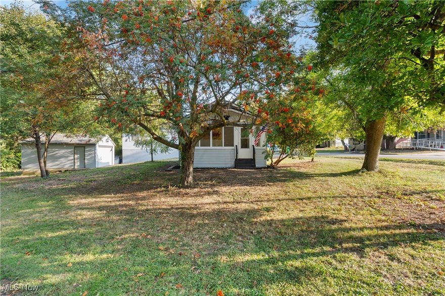 Welcome to this newly remodeled, turn key home in an adorable, quaint neighborhood. Everything in this home has been updated! The home features two nicely sized bedrooms and one bath, perfect for first floor living.  Home sits nicely on a large corner lot, with mature trees on a quiet street.  The large detached garage provides plenty of parking and room for storage. Find the perfect spot to sit and relax on the newly updated screened in front porch, which also provides an additional bonus space. Updates include: brand new roof, siding, windows, fascia, new vinyl flooring and paint throughout, brand new stainless steel appliances and granite countertops, fully updated/new bathroom and kitchen, brand new central air conditioner,  hot water tank, and more! This home will not last, set up your private showing today.