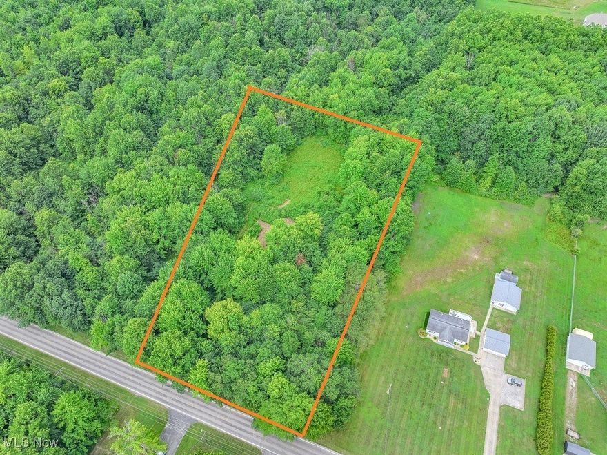 Don't Settle--get your land and BUILD YOUR DREAM HOME HERE!  Bring your Builder and walk this lovely 2 Acre parcel (with 200' frontage marked with pink ribbon on the west side of Austin Road just outside hearing distance of Geneva on the Lake.  It is a level lot, wooded on the front side and opens up as you walk back.  If you are doing a drive by...walk in a bit...City Water, Natural Gas and Electric available at street.