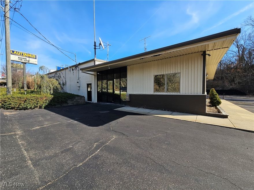 Discover endless possibilities with this 1.75-acre commercial property, perfectly positioned not far from the highway for maximum accessibility and within minutes of Ohio and PA! This versatile space is designed to accommodate a variety of business needs, offering spacious warehouse area with 14 ft door height for access, ample office space with reception and conference areas as well as room for training and telemarketing, a nice laydown yard area as well. Whether you're looking for storage, distribution, light manufacturing, or a dynamic flex space, this property provides the flexibility to adapt to your vision. With ample outdoor and indoor space, plus room for expansion, the opportunities are limitless. Don’t miss out on this prime location, schedule a tour today and explore the potential!