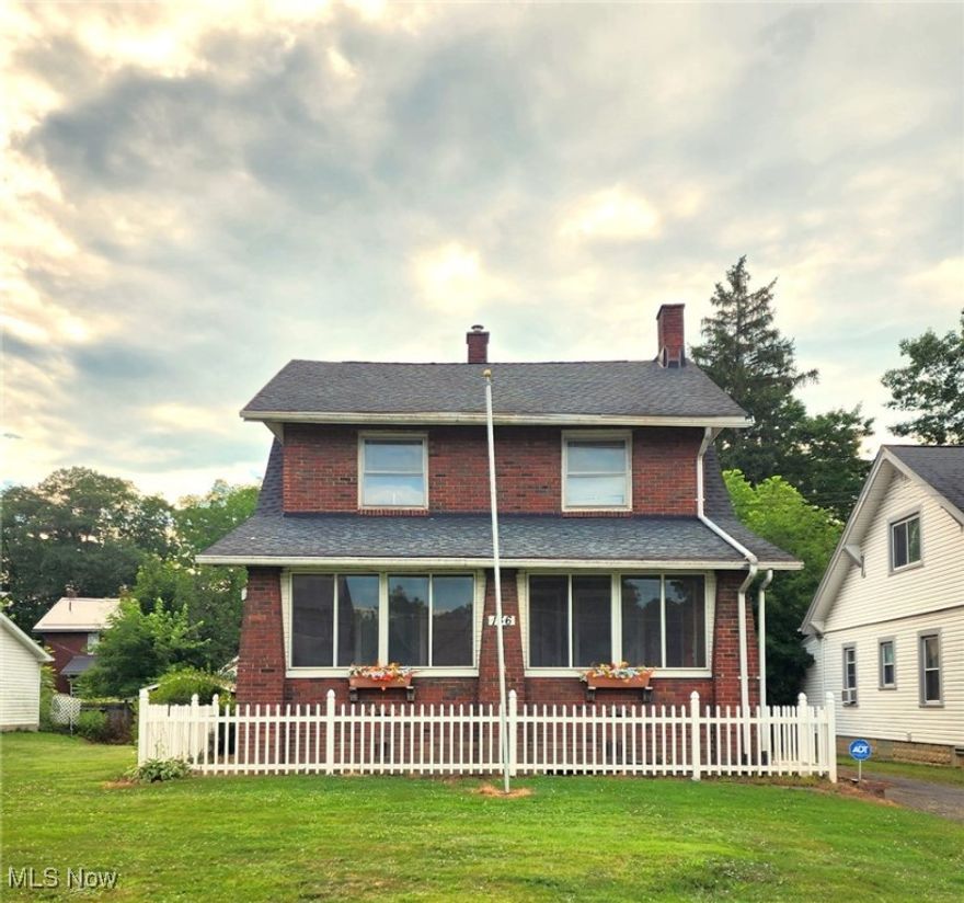 Charming All-Brick Colonial with 4-Car Garage & Extra Lot!

This beautifully maintained 3-bedroom, 1.5-bath colonial blends timeless charm with thoughtful updates. Located on a quiet, tree-lined street, this home features original hardwood floors beneath the carpet, rich natural wood trim, and a cozy fireplace in the spacious living room.

Enjoy meals in the large formal dining room or the sunny eat-in kitchen, complete with additional storage and a convenient half bath on the main floor. Upstairs, a walk-up attic offers endless potential—perfect for a home office, studio, or extra living space.

The full basement adds even more room for storage or hobbies, and the enclosed front porch is ideal for relaxing and enjoying the peaceful neighborhood.

Car lovers will appreciate the rare 4-car garage, and the additional lot offers plenty of outdoor space or future possibilities. A newer shed provides even more storage.

Major updates include a roof, HVAC system, and furnace—all under 10 years old—offering peace of mind and long-term value.