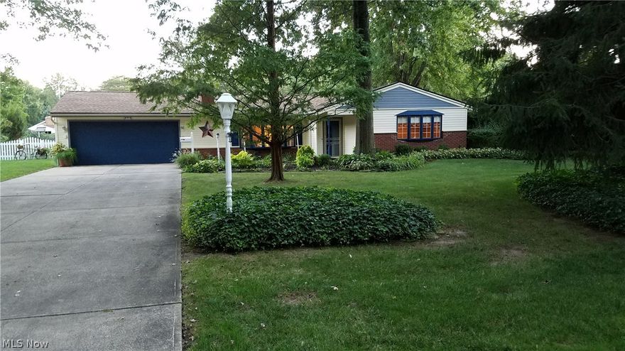 Welcome Home to this spacious ranch in a very desirable neighborhood. This home has a gorgeous 24x24 addition off back of home that is sure to please for all those holidays coming up. Just imagine your huge Christmas tree in this room! There are 6 sliding glass doors that lead out to the large fenced in backyard with 2 decks for entertaining. You also, have a large eat-in kitchen with oak cabinets and laminate flooring. You will love baking and cooking in this open kitchen. The attached 2 car garage will be great for all those rainy and snowy days to come this winter with easy entrance from kitchen.  In addition to the huge great room you also have a living room with fireplace so, plenty of room for a huge family gathering. All 3 bedrooms are spacious and have plenty of closet space. This home features a lot of updates throughout including: New vinyl siding in 2013, new roof 2012, hot water tank 2012, some newer windows, and new direct wall furnace in the great room. Don't miss out on