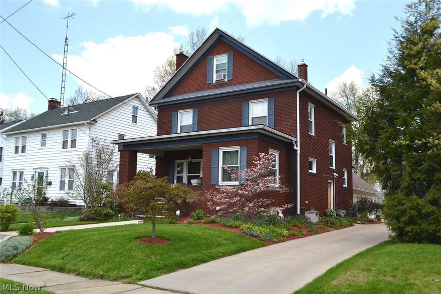 Featuring kitchen with Schrock cabinets, dining room with hardwood floors, large living room with hardwood floors and fireplace having wood burner insert,   foyer entrance off the covered front porch and laundry room complete the main level.   Three bedrooms and full bath with double sinks, garden tub and shower are located on the second floor and a fourth bedroom and play room are on the third level.   Divided basement with rec room, half bath, utility room and fruit cellar.  Breaker electric, new furnace in 2015, central air, on demand water heater, city water and sewer.  Natural woodwork and pocket doors throughout the home.  Detached 3 car garage with half bath, 12x34 loft, built-in cabinets  and wood burner.  Situated on 50x203 lot beautifully landscaped with fish pond and 8x12 storage barn.  The work is done!