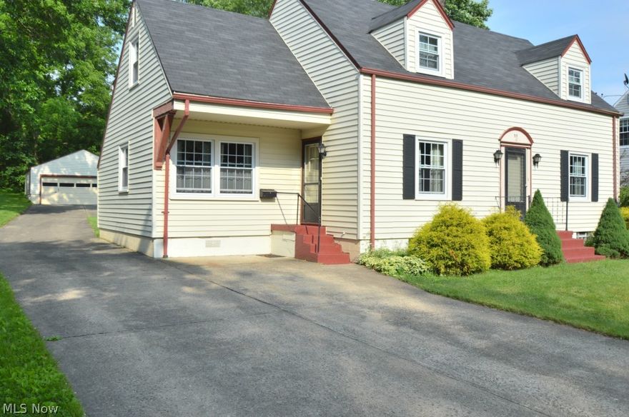 More than meets the eye in this large 5 bedroom, 3 bath cape cod boasting over 2,200 square feet of tastefully decorated living space.  Formal living room with original hardwood floors and fireplace, great for entertaining. Generously sized eat in kitchen with full appliances and access to family room & formal dining room. 5 bedrooms + additional rec room (sitting room) and 2 full baths complete the second floor.  Family room with wood burning fireplace and 3 season sunroom round out the first floor.  2 car detached garage w/ 220 hook up on large lot close to Hilltop elementary school and Greasel Park! Call Today....