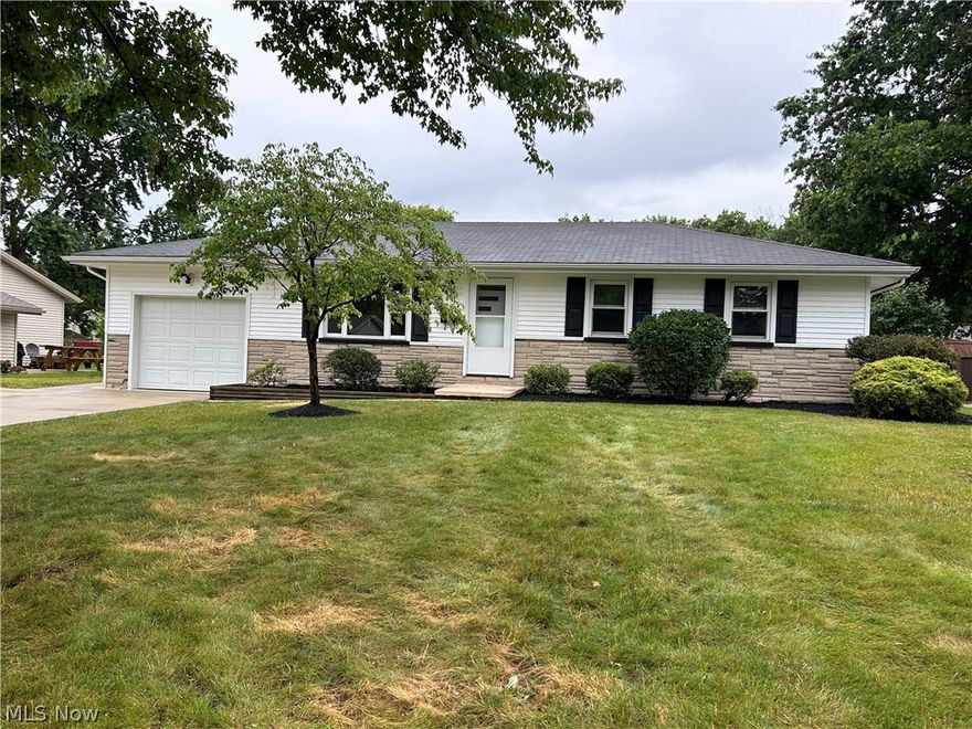 Beautiful, newly remodeled Ranch with 3 bedrooms and 2 new bathrooms. Includes a spacious addition with family room gas-wood burning fireplace and formal dining room with sliding door leading to patio with gas grill and fenced in back yard. Professional updates include, new kitchen cabinets with granite counter tops, subway tile and all new stainless steel appliances. There are two new bathrooms, new electric fixtures, freshly painted throughout and maintenance-free exterior with vinyl siding and newer concrete driveway. This home is located in the highly desirable Trophy Estates neighborhood in Austintown, is clean and ready to move in.