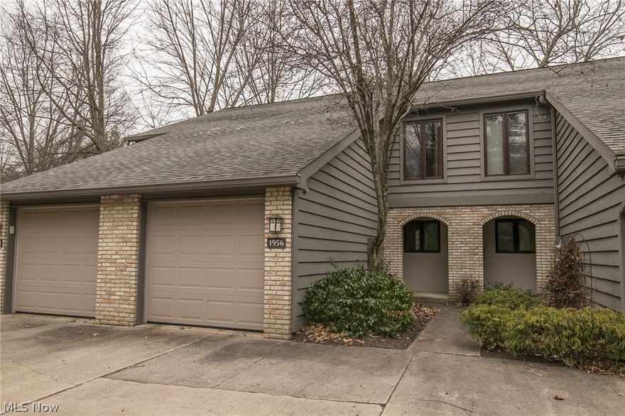 2 bedrooms with a loft.  Extremely well maintained.  Updated kitchen with granite counters and stainless steel appliances.  Kitchen is open to the dining and living rooms.  Living room features wood burning fireplace and sliding doors to the private back deck overlooking wooded lot.  Half bathroom on first floor with pedestal sink.  Wood flooring runs through the kitchen, dining room and living room.  Second floor with 2 very spacious bedrooms and 2 full bathrooms including the master suite with a walk-in-closet.  New carpet and neutral paint in January 2020.  Loft on the 3rd floor is perfect for an office, guest room, or 3rd bedroom.  1 car attached garage.  Great location!  Walk to Crocker Park and the Promenade!