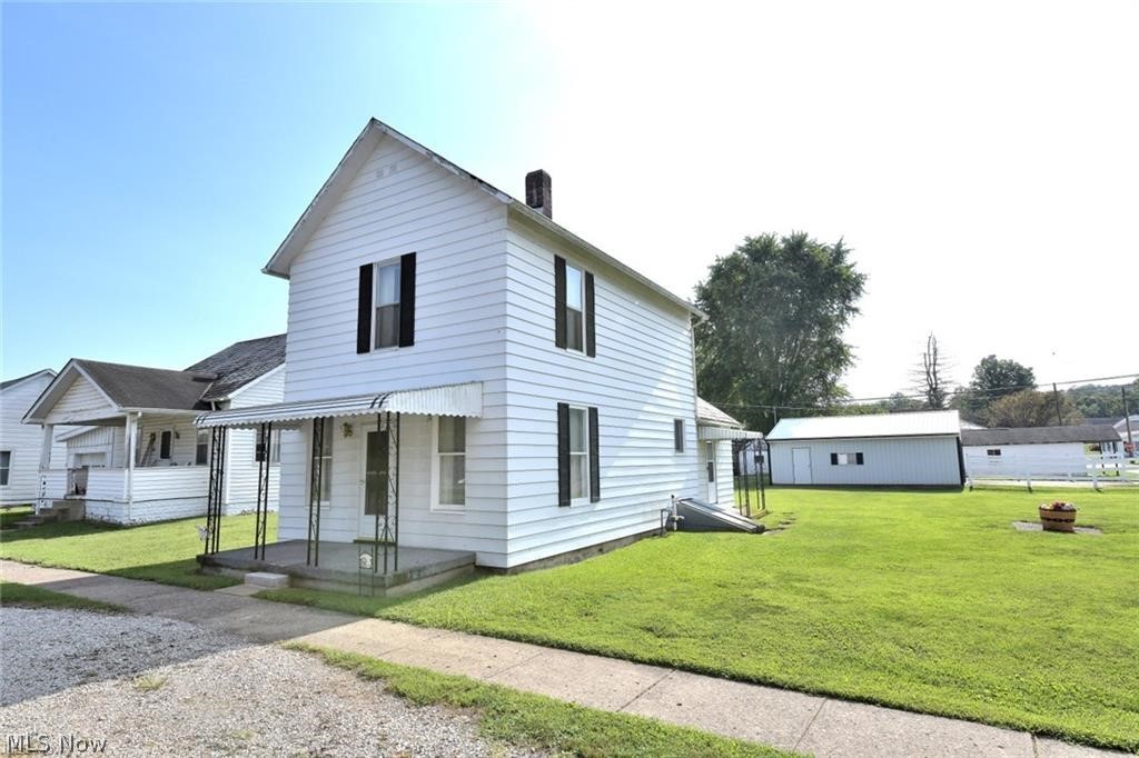 Two-story 2 bedroom, 1 bath home with a detached 2 car garage. This charming home is located on a corner lot with lots of yard space. Pets allowed, with owner's approval and additional fees. All applicants subject to credit and background check. Security deposit and first months rent due prior to move in.