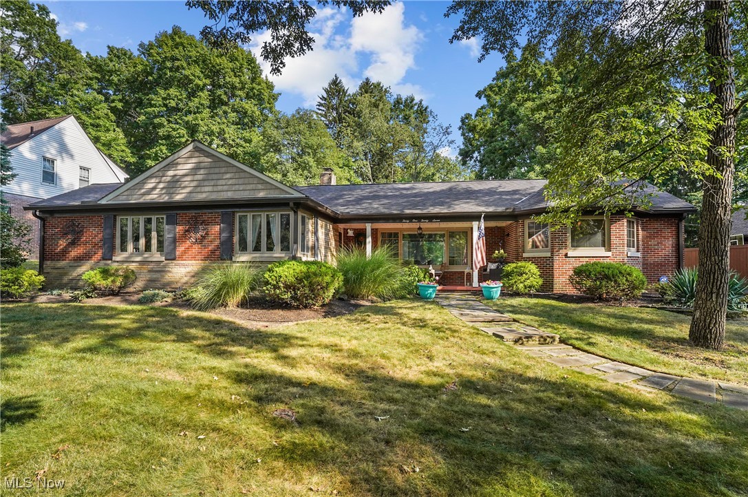 Welcome to this beautifully updated 3-bedroom, 2.5-bath custom brick ranch in the coveted Silver Lake Estates community — where timeless craftsmanship meets modern comfort. With over 2,000 square feet of above-grade living space, this home features original hardwood floors, Pella windows, and thoughtful, high-end updates throughout. The heart of the home is an open-concept living, dining, and kitchen area — a true entertainer’s dream. The light and bright living room features large windows on both sides and a gorgeous fireplace that can be either gas or wood burning. The chef’s kitchen boasts Woodmode custom cabinetry, quartz countertops, a farmhouse workstation sink, and a touchless Moen faucet, creating a perfect flow for gatherings. The spacious primary suite offers his-and-hers closets plus a third for extra storage, a newly remodeled luxe ensuite bath, and direct access to a sunroom that opens into a private brick courtyard — perfect for peaceful mornings or outdoor entertaining. Additional highlights include a covered front porch along the bike and hike trail — ideal for watching the energy of the village go by, a long blacktop driveway leading to a side-entry 2-car garage, finished basement offering flexible space for a rec room, gym, or office, and immaculate curb appeal on a well-manicured lot. Another great feature of the home is that it has been updated with accessibility features including a zero entry shower that is wheel chair accessible. This custom ranch blends elegance, warmth, and functionality in one of Northeast Ohio’s most desirable neighborhoods. This home includes exclusive Silver Lake membership privileges, with access to lake amenities, boating, fishing, and community events. Come experience the best of Silver Lake living and schedule your showing today!