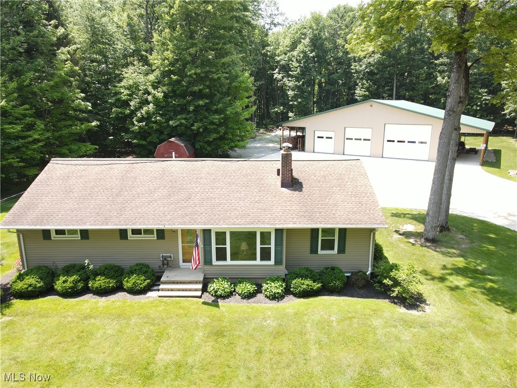 This Cozy three-bedroom ranch home is situated on a peaceful 15 acre lot. The lot boasts mature trees, a creek, lots of wildlife and is located across from East Branch reservoir. The home is move in ready and is just awaiting your personal touches. The Bathroom was completely remodeled in 2018. Other recent upgrades include: Harmon pellet stove, air conditioning, constant pressure water system, and whole house water filtration system. The real gem of this property is the 60' x 60' shop with 12' x 60' leantos off each side that are perfect for wood storage on one side and outdoor entertaining on the other. The outdoor wood boiler was upgraded in 2020. While running, it feeds the radiant heat floor and hot water to the barn & the house. The building's floor and the driveway are 6" thick concrete for added durability. This is truly a one-of-a-kind find! schedule your appointment today.