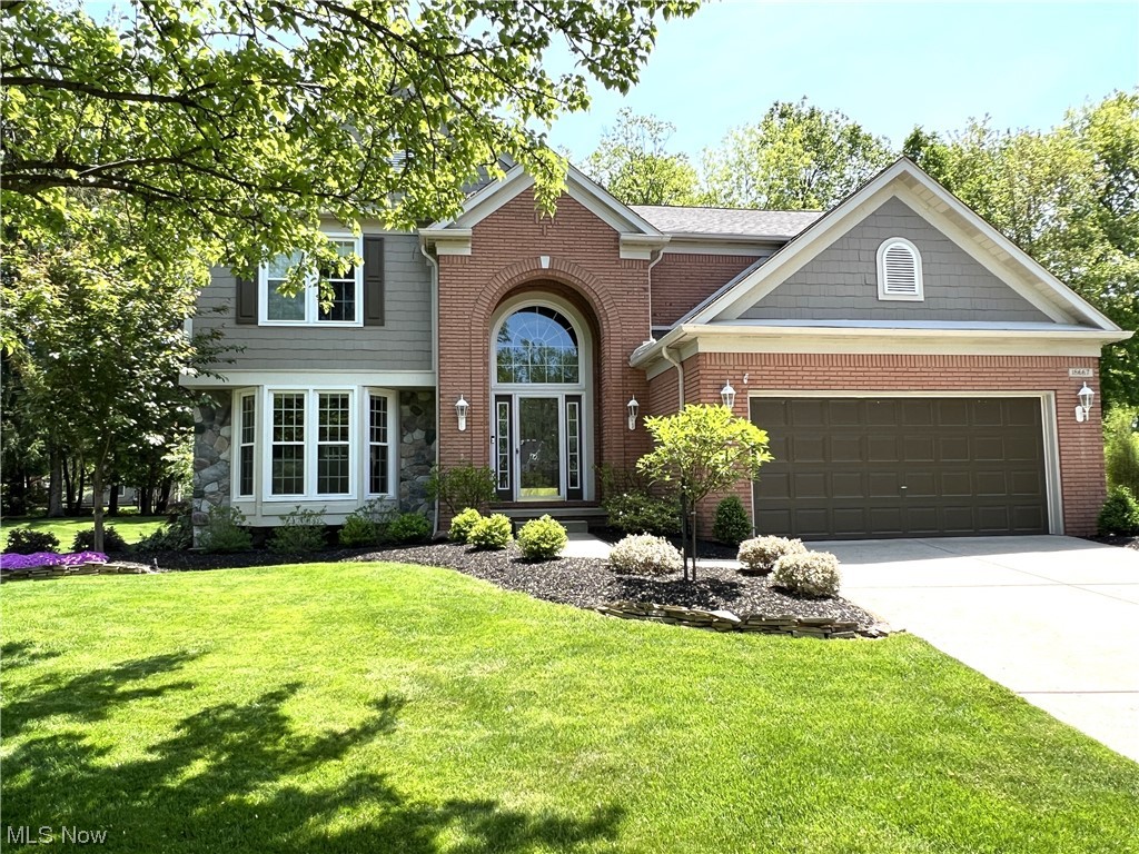 Beautiful one-owner 4 Bedroom colonial in desirable The Woods of Strongsville development. This home is located on a private cul-de-sac street on a large lot with irrigation where you feel like you are in a park setting. Walk into the two -story foyer into the large living room with custom cabinetry and large bow window. Updated white oak flooring is throughout the living, dining, kitchen, and foyer. The spacious dining room is bright with a beautiful view to the rear property through the bow window. The eat-in kitchen has been updated and is perfect for indoor/ outdoor entertainment. The family room boasts a custom marble gas fireplace. An updated half bath completes the first floor. On the second level you will find 4 spacious bedrooms with great closet space. The large master suite features vaulted ceilings, spacious updated bath with custom shower room and walk-in closet. A second updated full bath completes the second floor. The lower level has a finished room which is perfect f