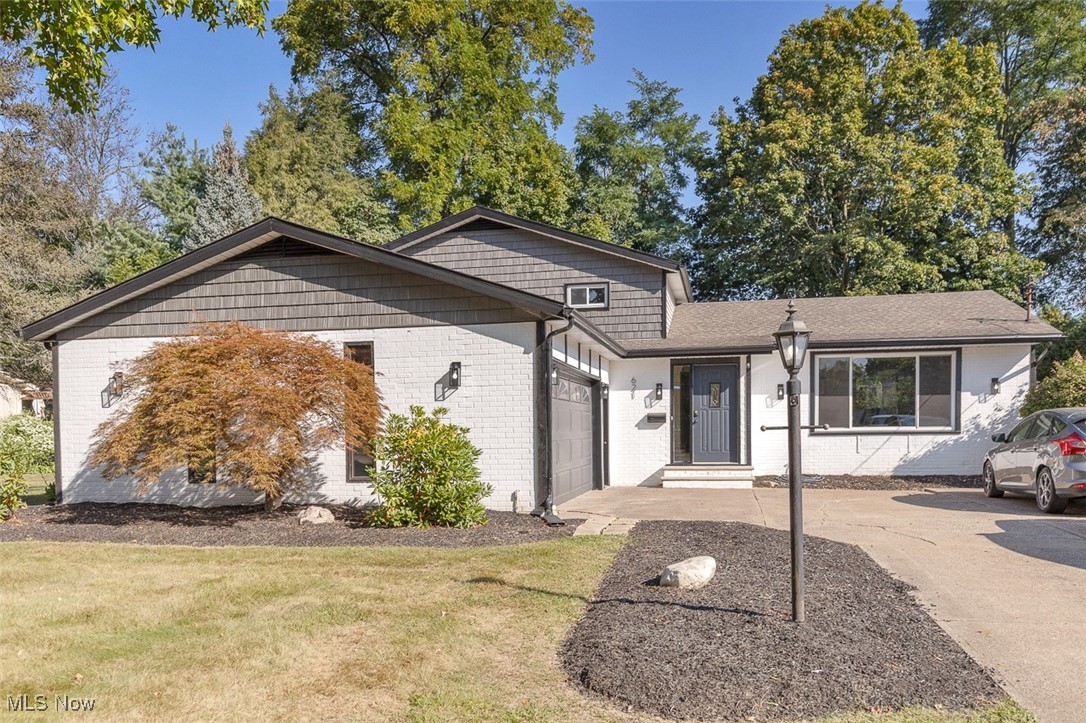 Grand Four Level Split with a Pool in Amherst! This Five Bedroom Four full Bath split level home is renovated and ready for it's new owners! Set in a beautiful neighborhood that has mature tree lined streets, this home has massive curb appeal with an updated exterior. New vinyl plank flooring and carpet has been installed throughout the home. New windows were added in 2025 and new furnace in 2024. Three bedrooms upstairs, and 2 full baths, which have been recently updated and upgraded with new tile, shower units and plumbing! The Main level features a large living room with vaulted ceilings and open to the dining room. The kitchen received new gorgeous white Quartz counters and a new sink and faucet in 2025. The deck in back was replaced in 2025, along with a new pool liner, pump and filter. The lower level has a huge family room with a fireplace and built in cabinets, a bedroom and a full bath. This level also has garage access to the attached 2 car garage with extra storage space. The basement was waterproofed with $27,000 basement system with breathe easy technology and a 25 year transferable warranty. The Basement also was completely finished with a full bathroom, new egress window added in the bedroom and a media room/den with recessed lighting. Easy access to highway,shopping and bonus: NO HOA headaches with this home! A one year home warranty is included in this turn key home and all appliances stay!