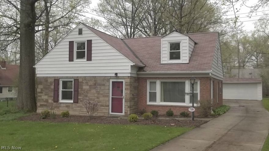 Spectacular renovation on a beautiful brick road in Cleveland Heights! Need large bedrooms? How about a 25x18 master suite with additional bonus area (19x11), en suite master bath with all new tub, custom ceramic surround, vanity & fixtures! 2 generously-sized 1st-floor bedrooms & completely remodeled full bath. Stunning kitchen with lots of new maple cabinets, custom counters, gorgeous fixtures, bar seating area, pass-through to the dining area, & all appliances included (dishwasher, disposal, stove, refrigerator). Other features: all new vinyl windows, new carpet throughout, brushed nickel hardware & fixtures, abundant storage space, new electric panel, efficient zoned boiler heat, 1st floor laundry, & no basement to worry about! Beautiful setting, with large yard, rear patio, 2-car garage with opener. Convenient location, just minutes from Downtown, University Circle, and highways. Offered violation-free and ready to move in! Seller will include a flat screen TV or window AC units w