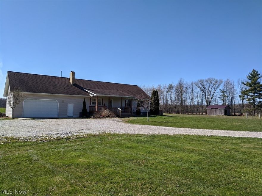 This stunning 3 bedroom, 2 bath custom Ranch located on 21.33 acres is the outdoor lovers paradise. The open concept living area with a stone fireplace makes entertaining a breeze. The home has oak trim throughout, vaulted ceiling and oak hardwood floors throughout the main level. Spacious kitchen with huge island offering plenty of storage and stainless appliances. First floor master suite with large soaker/jetted tub and walk-in closet. Tax records have home listed as a 2 bedroom but the 200 sq ft loft offers the third bedroom space. Finished walk-out lower lever with a stone fireplace. The room in the basement could be a fourth bedroom. The attached 2.5 car garage has a woodburner and offers an alternative heating source. Recent improvements include furnace in 2017, central air 2018, fenced in back yard, Samsung washer and dryer 2017, Samsung refrigerator 2017 and dishwasher 2017. The new french door with doggie door lead to the covered back deck. Other features include a 4-5 acre s