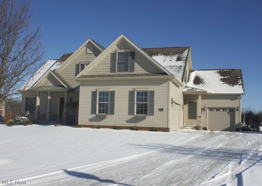 Welcome Home!  This stunning, 4 bedroom, 2 full and 2 half bath home boasts over 3,300 sq. ft. of total living space, a unique open concept floor-plan, and a 3-car garage.  The spacious kitchen includes stainless steel appliances, granite countertops, and incredible engineered hardwood flooring.  Upstairs balcony overlooks soaring two-story great room.  The walk-out finished basement is expansive and offers one large room of living space, half bath, and an additional large play-room (could be a 5th bedroom), and plenty of room left for storage. Outside the upstairs great room/kitchen area opens to a large 15 x 13 sq.ft. deck, and the walk-out basement opens to a 15 x 13 sq. ft. covered patio (below the deck).  The manicured yard sits adjacent to Strausser Elementary School, offering views of Strausser’s rolling hills of open space that will not be developed.  Large pine trees at the back of the lot provide plenty of privacy. Priced at $328,000, this one won’t last.