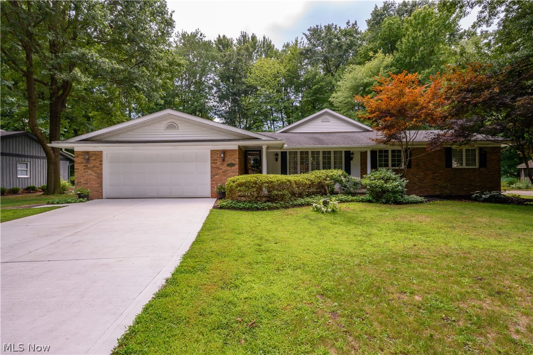 Extremely nice and well maintained three bedroom 2.5 brick and vinyl ranch in Jackson Twp. This lovely home is nestled on a gorgeous, private lot surrounded by trees. Truly your own paradise featuring 20x40 inground pool, large private brick patio with hot tub, and good sized partially covered deck. The interior of this stunning property boasts a dream kitchen that is open and inviting with hardwood flooring, a fireplace, and breathtaking views of the rear yard and pool area. There is also a delightful screened in porch to enjoy, with access from the kitchen and the fireplaced family room; porch also overlooks the amazing, fenced rear yard. Master bedroom with private bath has access to rear brick patio/hot tub; in addition to the office with custom cabinetry. Two other bedrooms, full bath, and first floor laundry/half bath. Rec room in the bsmt with other carpeted rooms for various uses, and walkout stairway to brick patio. Public water/sewer with well-kept for pool, hot tub and water