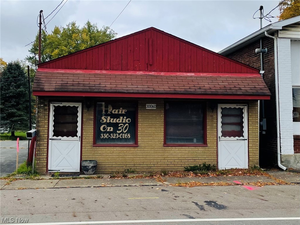 The possibilities are endless for this quiant downtown commercial building. Rent out one side, and use the other for your next business. Two store fronts on US Route 30 with front of store parking. One side was used as a salon and the other was used as a retail space some years ago. One furnace, and one shared restroom. Priced to sell and start your own business!