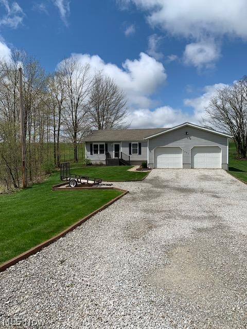 Beautifully maintained ranch house on a quiet, secluded road. 3 bedrooms, 2 bath, finished basement with large storage area. Open floor plan. Remodeled kitchen with granite countertops, all new appliances, new hot water heater, newer roof, new windows. Attached 2 1/2 car garage. Shed in back of property. Extra large deck in the back with tons of privacy and beautiful views. Beautiful stone walkway to from door patio. City water and Public Sewer, country living with city amenities! Enjoy view of beautiful sunsets from your private deck on Cinnamon Lake! Only a few hundred feet from 133 acre Cinnamon Lake but with all the privacy you would want. Best of both worlds! One hour from Cleveland and Akron, Cinnamon Lake is a private gated development offering swimming/ beach and pool, fishing in a stocked lake, walking trails, playgrounds, scheduled activities, lodge and community center. In the heart of Ohio’s Amish Country. This is a must see property. Ohio’s best kept secret in residential