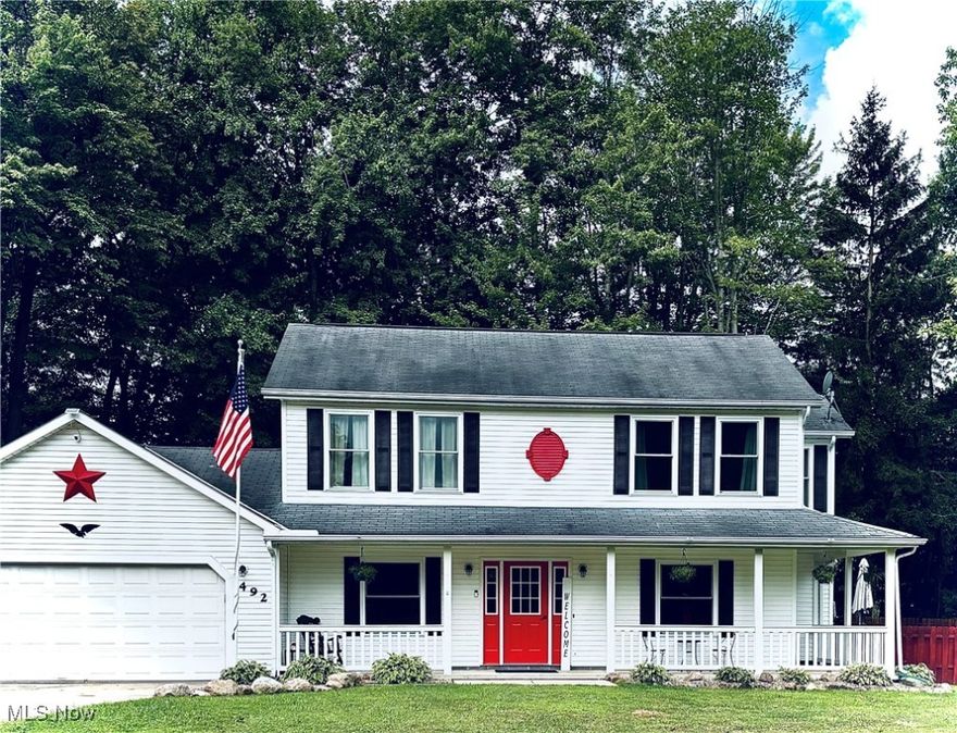 Welcome to this 4 bedroom, 2.5 bath colonial in Geneva! Upon entering the home, you will be captivated by the natural light coming through the new energy efficient windows (2020) and the new paint & carpeting (2025). You will be greeted by the spacious living room. Through the archway you will enter the cozy family room with a gas fireplace. As you continue through the house you will enter a flex room with sliding doors that welcome you to a 3 seasons room, perfect for sitting out and watching your family play in the fully fenced backyard offering privacy and security.  As you pass through the spacious laundry room you will find an updated half bath that grants access to another flex room. This room has two doors, one into the house and the other into the heated garage. Perfect for a home office or additional storage. Up the stairs you will find 4 bedrooms, the master with a full bath and double closet. The upstairs bath is updated with a new vanity, vinyl flooring and light fixtures. The entirety of the upstairs has new vinyl flooring, carpeting, paint and light fixtures as of 2025. You will be impressed by the amount of storage and closet space. Other updates to this home include, new hot water heater, heat & insulation added to the garage in 2021, new light fixtures added to the dining room & kitchen. The back yard is fully fenced with gate access on each side of the property.