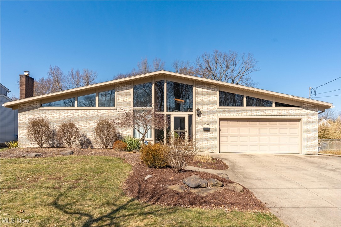 Welcome to your dream home in the heart of Ellet/Akron. This California Ranch boasts over 2,600 SF of living space and has had many recent updates. Entering this home you will find a screened in entryway that leads to the open foyer with large skylight in the center. The spacious Living Room features a brick wood burning fireplace which opens into the oversized dining room with floor to ceiling windows. The kitchen has been beautifully updated and maintained with new appliances, cabinets, countertops and contains a double wall oven. Eat-In Kitchen area with oversized windows overlooking the backyard, patio and in-ground pool through the sliding glass doors. Laundry room is conveniently located on the first floor with utility sink and extra storage. Master Bedroom features three double closets and an ensuite bathroom with walk-in shower, heated floors and additional access door to patio for convenience. Additional full bathroom and half bathroom. Four additional bedrooms on main level, all with sizeable closets. Any of the bedrooms could also be used as an office space. Storage will not be an issue with the abundance of closets throughout the home. Oversized attached 2-car garage with cold water hookup and the stairway access to basement. The basement is partially finished with a built in Sauna, hot tub (negotiable), large storage room that also has access to the large crawl space area that could easily be used for storage as well. Backyard is completely fenced in with patio, heated inground pool and pergola for entertaining. Roof 2020. HWT 2022. Two A/C units - one new in 2022, second unit possibly 10 years old. Don't wait - call today to schedule a private showing!