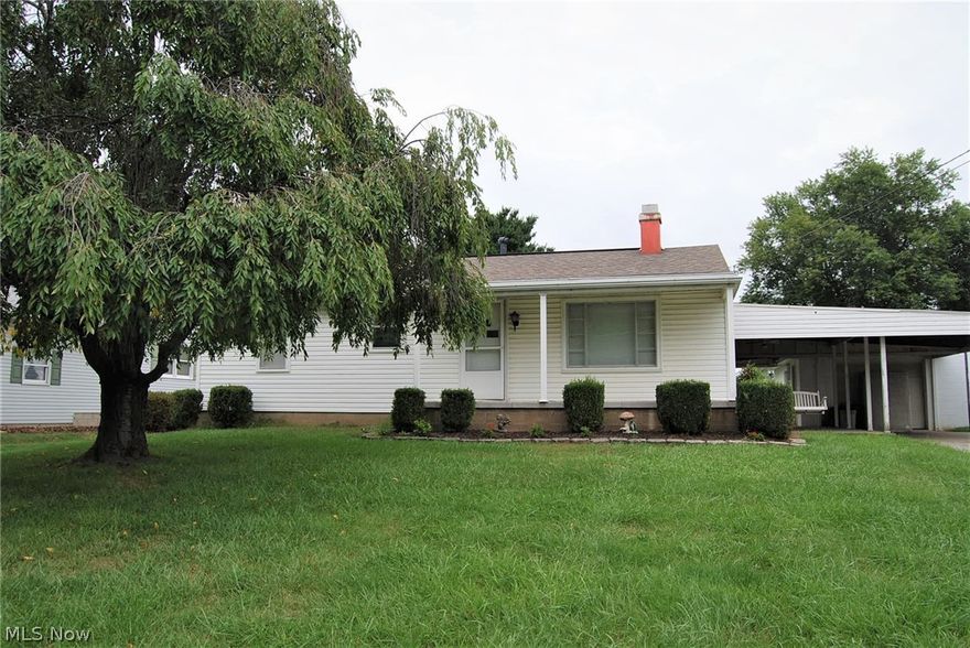 Charming 3 bdrm north end ranch. Living room has nice cozy fireplace.  Lower level lots of room to have a family room and has a room for your workshop.
Roof is 5 years. Gas heat and central air. Carpeting with hardwood floors. Outside nice covered patio and level yard. Nice block garage and carport with plenty of room for parking. You will love the easy access to all your restaurants, shopping banking and hospital. Call for your private viewing.