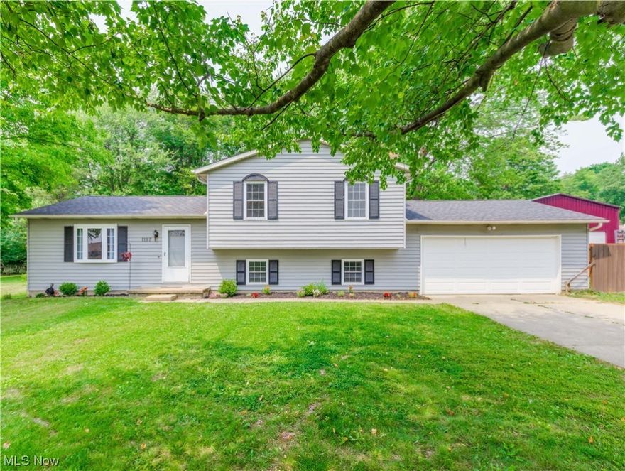 This Brimfield beauty just might be the one you've been waiting for. This attractive 4 level split is conveniently situated near I-76, shopping and is within the Field local  School District. Step into the formal living room that is open to the dining area and leads to the kitchen. This area is light, bright and open. Beautiful kitchen with light colored cabinets, subway tile backsplash, granite counters and stainless appliances.  Sliders to the deck overlooking the private backyard. Up a few stairs to three bedrooms and a beautiful bathroom. Down a few steps to a family room with fireplace and an area that was converted to create  an office and 4th bedroom but designed  to easily be converted back to one room. Then there's a basement with a full bath and rec room or work out room. Updates include a complete tear off roof in 2019, central air in 2019,exterior painted in '19, a repurposed shed in '16, new gutters in '16, updated electric panel, newer well pressure tank and water softner