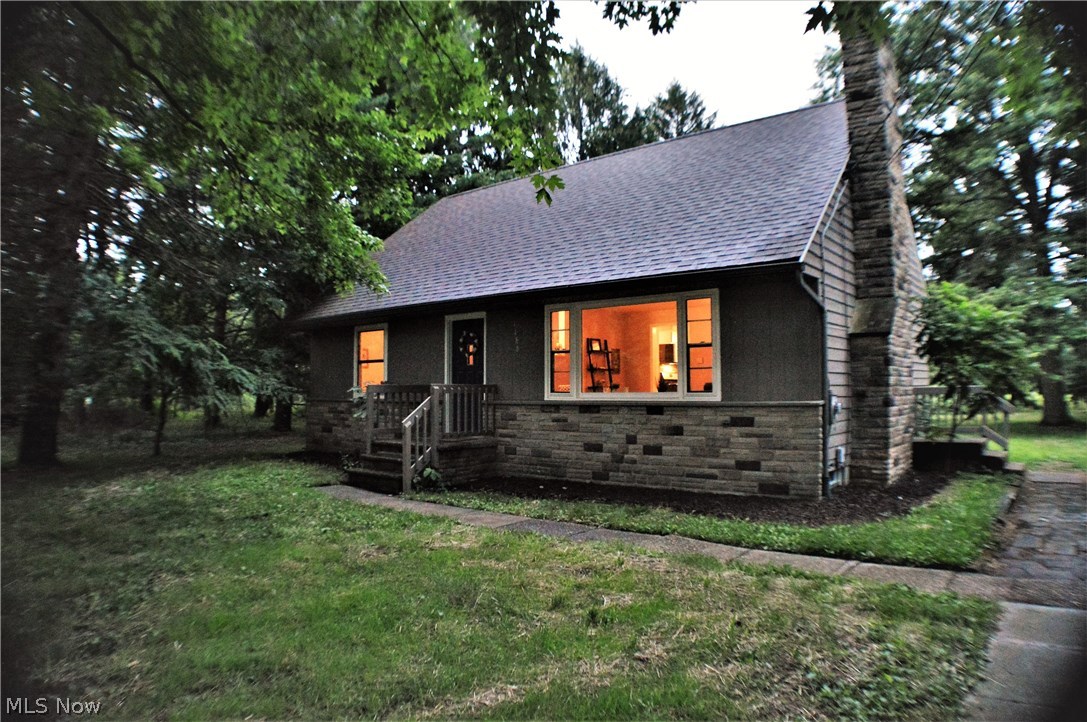 Welcome to 1188 E. Howe Rd in the desirable Tallmadge community! This Completely renovated 4Bed 2Full bath Cape Cod Screams versatility and mixed use! Updates include Brand new Paint through out all interior walls, brand new flooring through out interior- (NEW laminate Wood on first floor, NEW Tile in kitchen and bathroom floors, NEW carpet starting at stairway going through entire second level). Additional updates include Brand New Stainless steel kitchen appliances, granite style counter tops throughout and tile/glass back splash for both bathroom showers! *in 2016 The furnace, hot water tank, gutters and down spouts were replaced as well as exterior painted. *2013 roof replaced* *wood burning fireplace in living room* *Tallmadge schools* *quiet treed lot just under half acre* Great opportunity for traditional buyers and Investor looking for something "Turn key!"