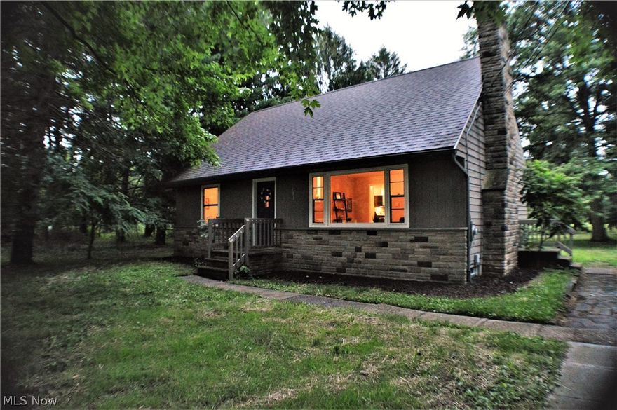 Welcome to 1188 E. Howe Rd in the desirable Tallmadge community! This Completely renovated 4Bed 2Full bath Cape Cod Screams versatility and mixed use! Updates include Brand new Paint through out all interior walls, brand new flooring through out interior- (NEW laminate Wood on first floor, NEW Tile in kitchen and bathroom floors, NEW carpet starting at stairway going through entire second level). Additional updates include Brand New Stainless steel kitchen appliances, granite style counter tops throughout and tile/glass back splash for both bathroom showers! *in 2016 The furnace, hot water tank, gutters and down spouts were replaced as well as exterior painted. *2013 roof replaced* *wood burning fireplace in living room* *Tallmadge schools* *quiet treed lot just under half acre* Great opportunity for traditional buyers and Investor looking for something "Turn key!"