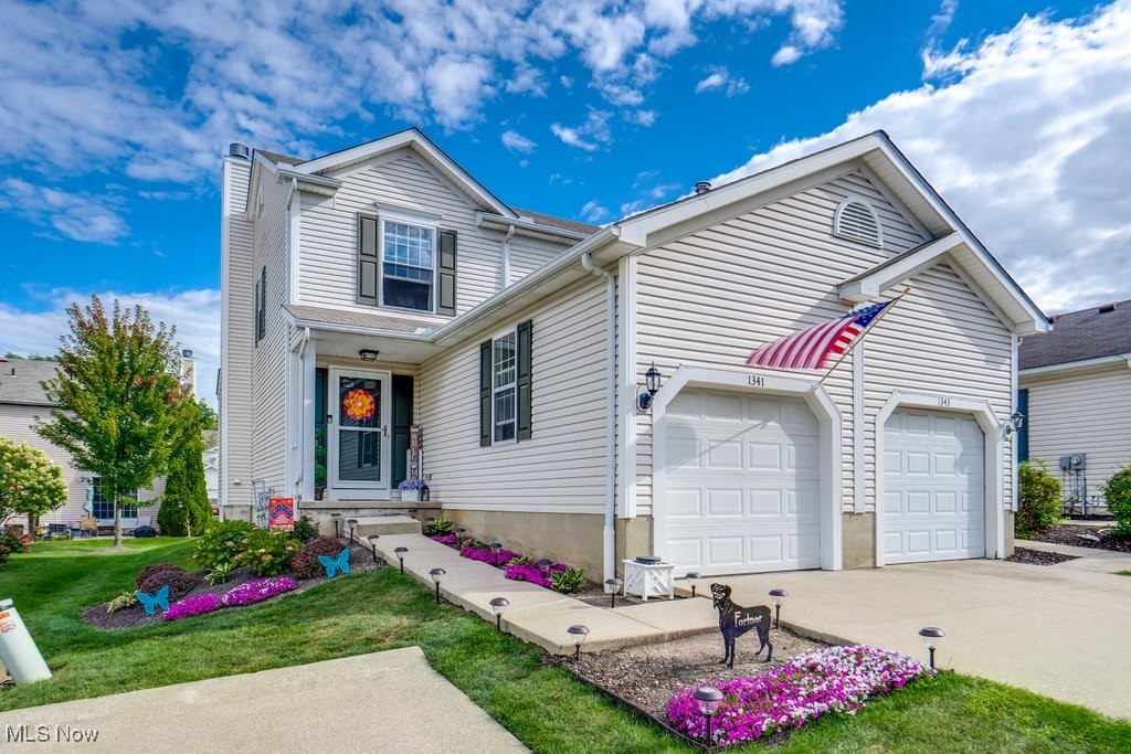 Welcome to 1341 Adele Rd, a beautifully updated end-unit townhome featuring a gas fireplace with full brick hearth and a fully finished basement with family room and wash area. Major updates include new hot water tank (2019), Carrier 2-stage furnace and AC (2022), stove (2022), refrigerator (2023), washer (2024), dryer (2025), carpet and hardwood flooring (2019), and patio (2019). Additional features include a Honeywell smart thermostat, new vents, new window, and new slider tracks. The primary suite offers double closets, and the second bedroom has a walk-in closet. HOA covers lawn care, snow removal, and mulch. Rentals permitted. Conveniently located near shopping, dining, entertainment, and freeway access, this move-in ready home offers low-maintenance living with modern upgrades.