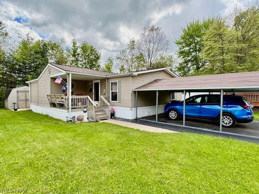 Amazing opportunity to own this really nice well cared for 3-bedroom mobile home located in Howland Village Park. Situated on a quiet cul-de-sac in the very back of park. Enjoy the rippling stream in your back yard while sitting on your amazing private well-built deck. Shed has electricity. Gas grill, firepit and sand box all stay. Open eat in kitchen with breakfast bar. 2 full baths. Living room and also nice family room with gas fireplace. Nice laundry room with plenty of cabinet space. All appliances stay! Roof new in 2023 Furnace new in 2025. Newer dishwasher and refrigerator. Schedule a tour today to enjoy easy living!