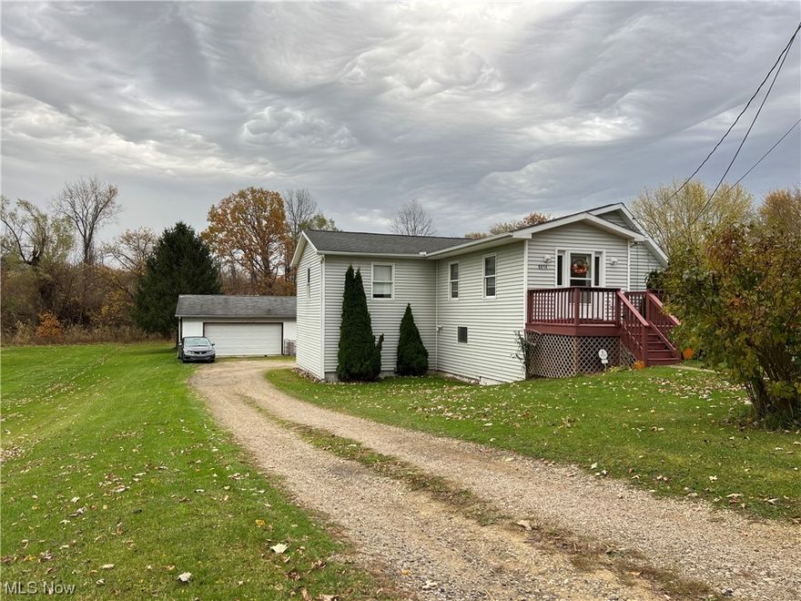 Much larger than it looks from the road, this 1800+ square foot hillside ranch is deceptively roomy once you get inside. The main floor features a spacious living room with electric fireplace, XXL eat-in kitchen that offers stainless steel appliance package, a dining area, office area and beautiful sunrises from the attached covered deck! Additionally the 1st floor is home to the master bedroom and a full bath with laundry. The lower level is unique in every way, in that it offers a large family room area, 2 bedrooms, a second full kitchen plus a utility/laundry room, all with direct access to the 1.64 acre lot, 24' x 32' 2.5 car detached garage and 16' x 32' lean-to. City water, E-Z access to Interstate 90 from this Route 45 location.