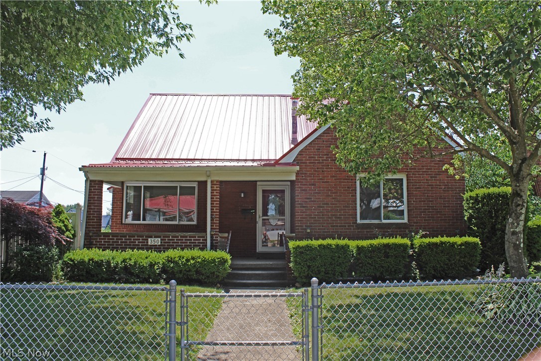 Welcome to your next home! This beautiful brick house with a newer metal roof features more than 1500 square feet with three bedrooms, two bathrooms, and abundant closet space. Downstairs, you will find a one car garage and a partially finished basement with a rec room. The fenced in yard offers space for your pet to roam and is home to a quaint storage shed in the back to keep your lawn equipment in. Call today to schedule your showing!