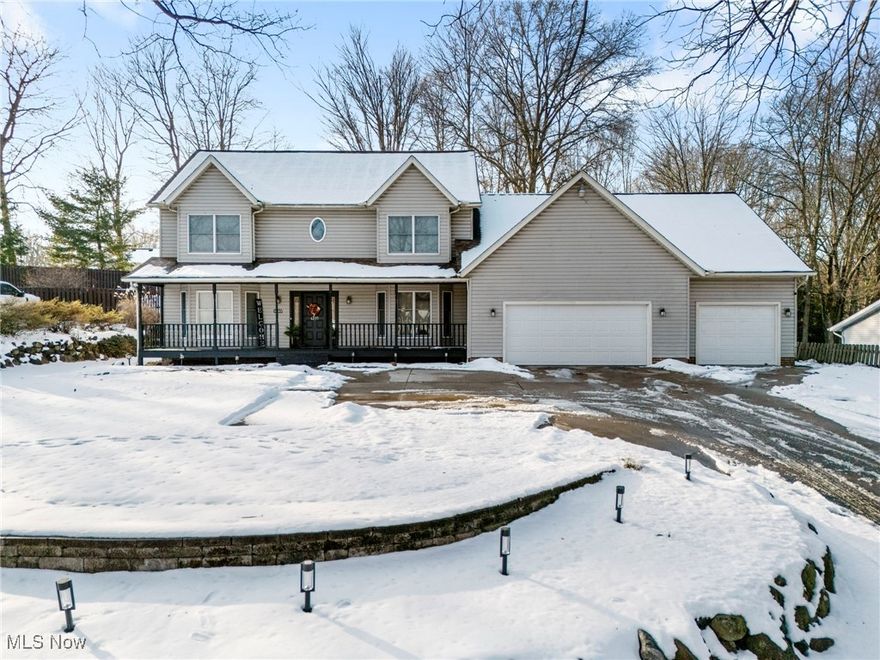 This custom-built 5-bedroom, 4 full bath Colonial in Kent is truly move-in ready, with updates already done from top to bottom. From the covered front porch, step into a bright and inviting home where the living and dining rooms flow nicely and offer beautiful views of the backyard. The kitchen is the heart of the home, featuring plenty of cabinetry, a large island, granite countertops, double ovens, and a casual eating area—all opening to a stunning great room with a vaulted wood ceiling and an updated brick fireplace, perfect for gathering and entertaining. The main level also offers two bedrooms and a full bath, ideal for guests, a home office, or flexible living needs. Upstairs, the spacious primary suite includes a private bath and walk-in closet, along with two additional oversized bedrooms and another full bath. The walkout basement adds even more living space with a large rec room, full bath, laundry area, and a bonus room that works great as a gym or hobby space, or even a potential in-law suite. Outside, the backyard feels like a private retreat with a waterfall, huge deck, fire pit, custom retaining wall, and professional landscaping. A 3-car garage provides plenty of storage and convenience. Major updates include a new roof (2017), new furnace and central air (2024), new hot water heater (2024), whole-home water purification and softener system, updated kitchen and appliances, new flooring throughout, basement waterproofing, and a newly refinished basement in 2024. There’s truly nothing left to do but move in and enjoy.