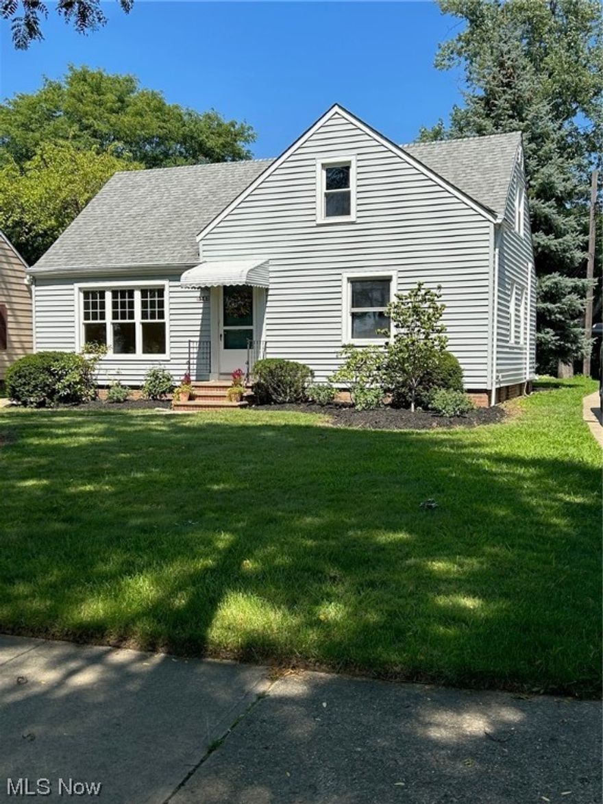 Situated on a quiet, tree-lined street, this updated and move-in ready home is ready for you to move in. The remodeled kitchen (2023) has new cabinets, tile, fixtures, appliances, and flooring. The new flooring (2023) extends into the spacious freshly painted dining room. The living room and two first floor bedrooms have hardwood floors. The upstairs area was freshly painted, with new carpeting (2023) and a separate HVAC system (2023) installed. The cozy upstairs has a ½ BA and is divided into 4 areas including a reading nook/built-in bed, desk, and two other rooms. The large clean basement is ready for your design inspirations. Updates include AC (2023), large 2 car garage (2009), roof, vinyl siding, and landscaping. Close to shopping, parks, and the freeway make this house a must-see. Come check it out.