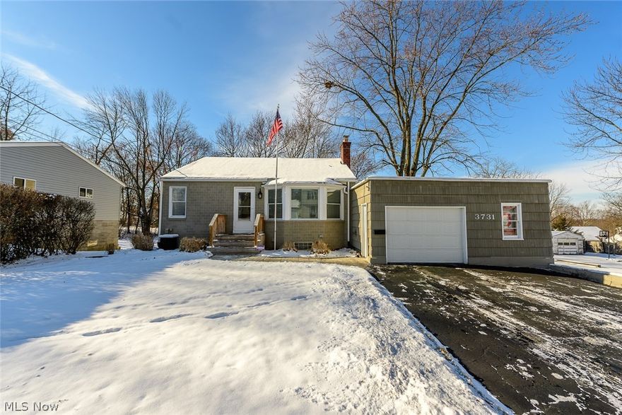 Move right into this nicely updated 2 bedroom, 1 bath home located on 2 lots. This unique home offers a huge living room with new flooring, big windows, and a beautiful fireplace. 2 spacious bedrooms. Full bath with lots of storage. Large kitchen with pantry and appliances that convey. A bonus room currently being used as an office could also make for a nice dining room. The walk out lower level is mostly finished with a large rec room with windows and still tons of space for storage. Oversized 1 car attached garage gives additional storage and has garage doors on both ends of the garage so you can pull thru to the additional garage located behind the home. The extra garage also offers tons of potential to be used as a workshop, gym, or anything else you could possibly need it for. A covered patio and paver patio round out everything this home has to offer. You have to see this one to appreciate everything it has to offer.