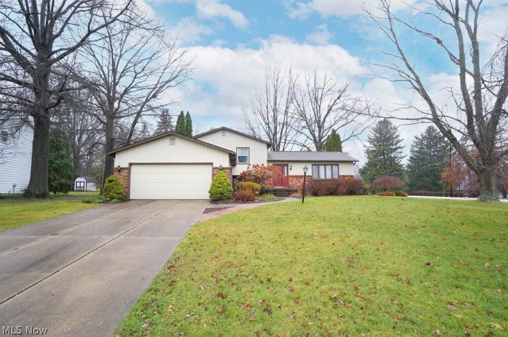 Step inside and check out this fabulous Tallmadge split level! You will love this large, open floor plan with plenty of space on every floor! This fabulous Tallmadge 4 level split level features over 2000 square feet of living space! The master bedroom features a full bath and the house features 3 full baths. Other features include Windows 2015, glassblock 2021, AC 2015, Exterior painted, and additional attic insulation. The outside features include nice large yard with a deck off of the kitchen/dining area. This home offers something for everyone and for all seasons. Call your favorite real estate professional today and schedule your private showing!