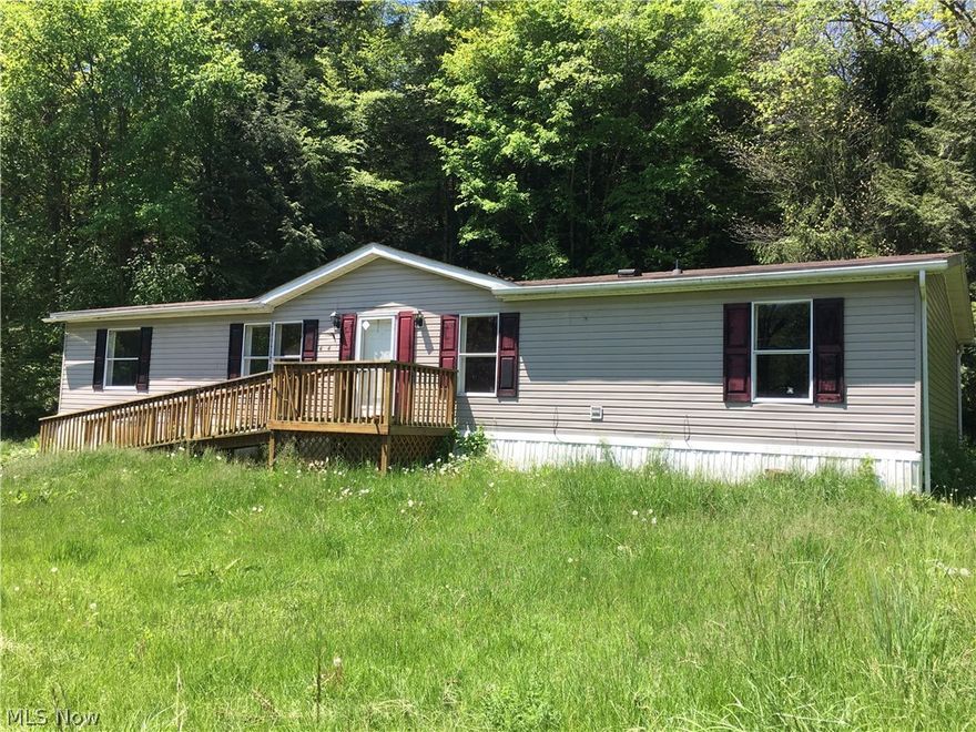 Country property 10 minutes from Wooster.  Seclusion is the first word that comes to mind with this home.  Renovate current home or build.  Home needs some work.  Home will sell as is.