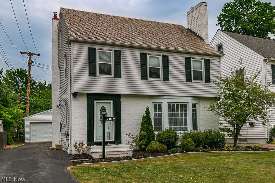 Spacious 4 bedroom Colonial with many updates.  Foyer with ceramic tile has half bath and leads to side entrance with mud room area. Updated eat in kitchen has  maple cabinets with soft close drawers, granite counters, stainless appliances, ceramic tile floor and tile backsplash. Entertain with ease in the formal dining room which is open to the living room with a fireplace and the family room that overlooks the backyard. Both bathrooms have been updated with ceramic floors, a tiled shower/tub combo on the 2nd floor.  Electrical is a 200 amp service, Furnace replaced in 2015. Lower level is partially finished with a rec room having a fireplace. Cozy backyard includes a patio and raised flower/garden bed. County records show original garage razed and new garage built in 2005. Walking distance to University Library and many shops and restaurants. Minutes to downtown Cleveland, Hospitals, University Circle.