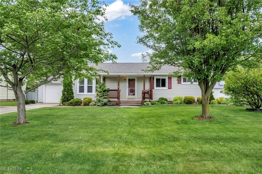 Beautifully updated and well-maintained home offering the perfect blend of comfort, character, and outdoor enjoyment in a quiet North Olmsted neighborhood. From the moment you arrive, you’ll appreciate the inviting charm of the covered front porch. Step inside to find a warm and welcoming interior. The kitchen features luxury vinyl flooring, stainless steel appliances, and an abundance of counter space and cabinetry.
The first floor boasts gorgeous original wood floors throughout the living and dining rooms, creating a cohesive and polished look. The dining room includes a newly installed sliding glass door that opens directly to a large backyard deck, allowing for effortless indoor-outdoor living and easy access to the backyard oasis. Three comfortable bedrooms, all with original wood floors and ceiling fans with integrated lighting. The full bathroom is conveniently located near the bedrooms, plus a half bathroom adds extra convenience for guests and daily living. The full basement has been professionally waterproofed and adds incredible bonus space, including a large recreation room with a dry bar, glass block windows, and an additional finished area perfect for a home office, workout room, or playroom. A separate utility/laundry room provides even more functionality and storage space. Outside, the property truly shines. The large, fully fenced backyard features an expansive deck with a hot tub, an above-ground pool with its own smaller deck, and a dedicated shed for pool and outdoor storage. The shed, pool, and hot tub all stay with the home, offering an exceptional value and instant enjoyment for the new owner. There is also plenty of open yard space to garden, play, or simply relax. Notable updates include a newer A/C system, a roof that was replaced just two years ago, and most of the windows have been upgraded and come with a lifetime warranty, ensuring energy efficiency and peace of mind for years to come.