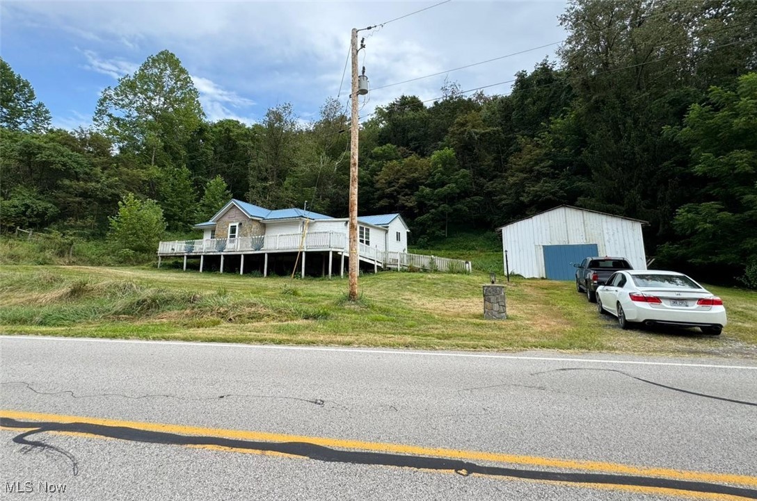This charming home, built in 2014, sits on a 0.3-acre lot. The interior features easy-to-maintain laminate flooring and was painted just three years ago. You'll appreciate recent updates like the addition of a second bathroom and a new water heater installed last year. The property offers ample parking and storage with a barn style detached 1-car garage. The full, unfinished basement provides a blank canvas to create your own space. Enjoy comfortable living with central heat and window air conditioning.